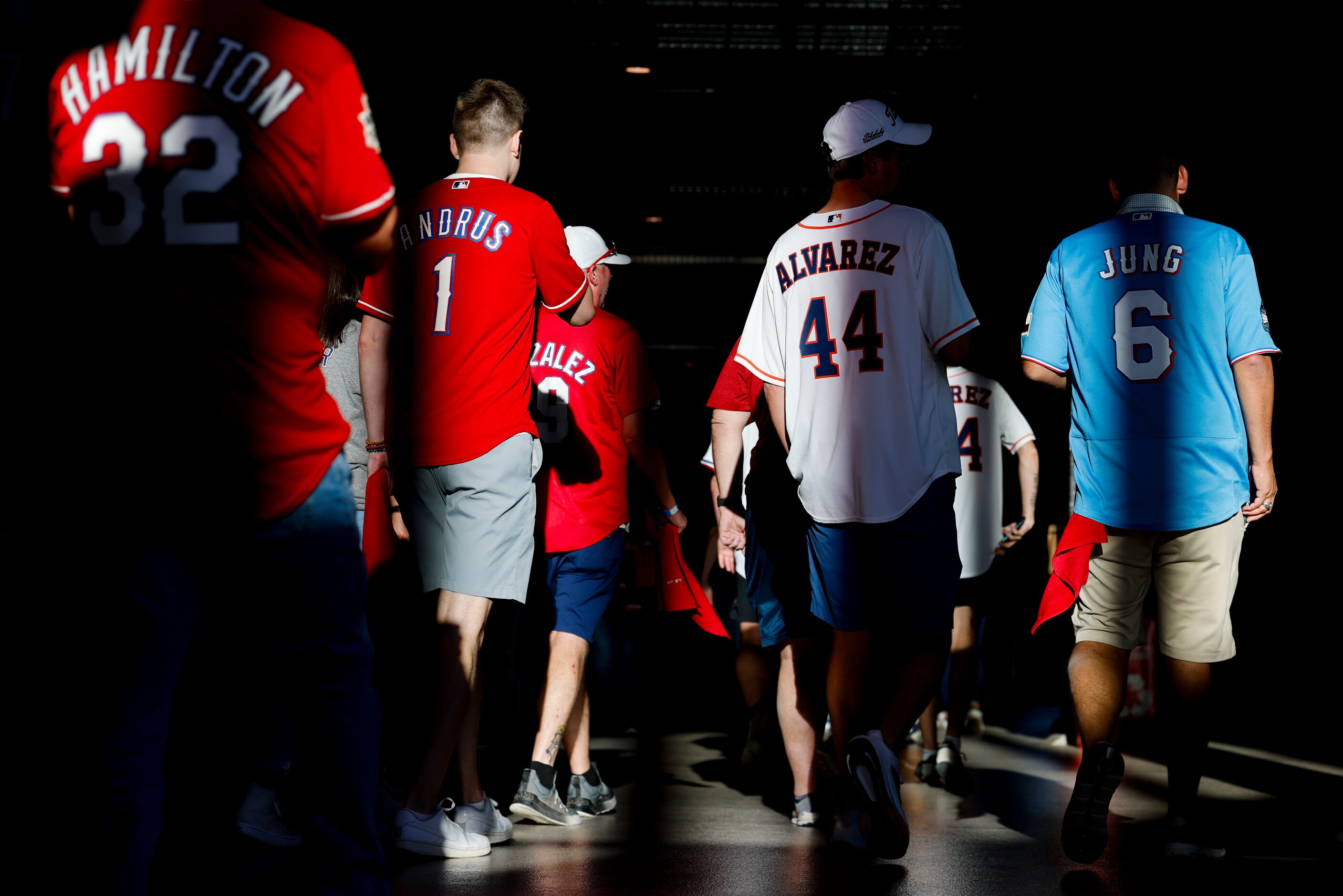 Baseball fans walk around Globe Life Field ahead of Game 4 of the American League...