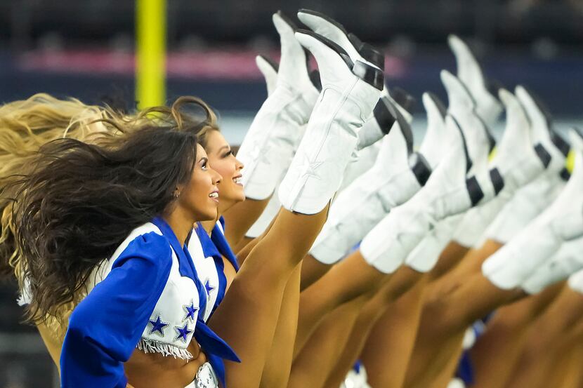 The Dallas Cowboys Cheerleaders perform before a preseason NFL football game against the...