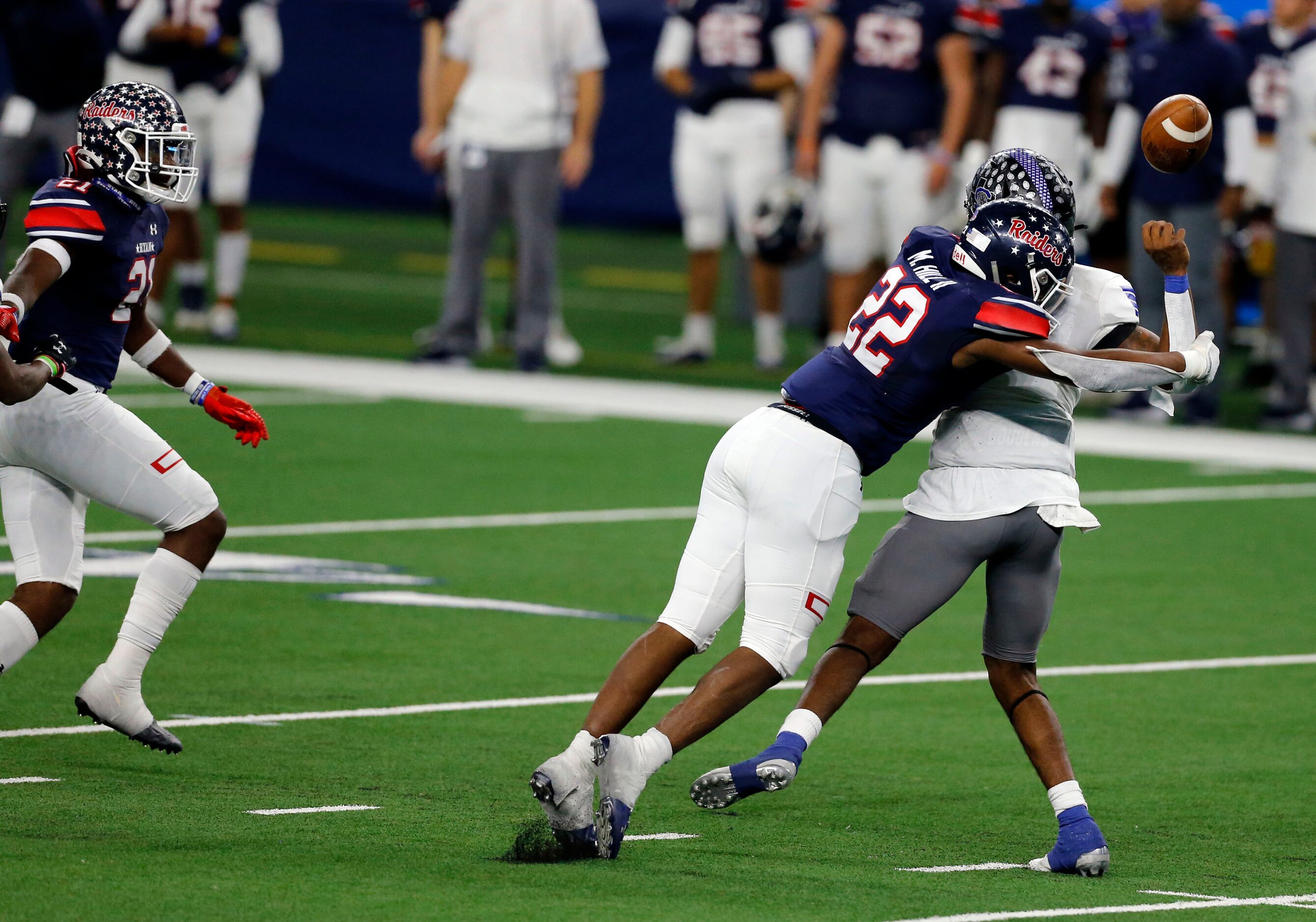 Denton Ryan defender MarQuice Hill Jr. (22) forces a fumble from Mansfield Summit Qb David...