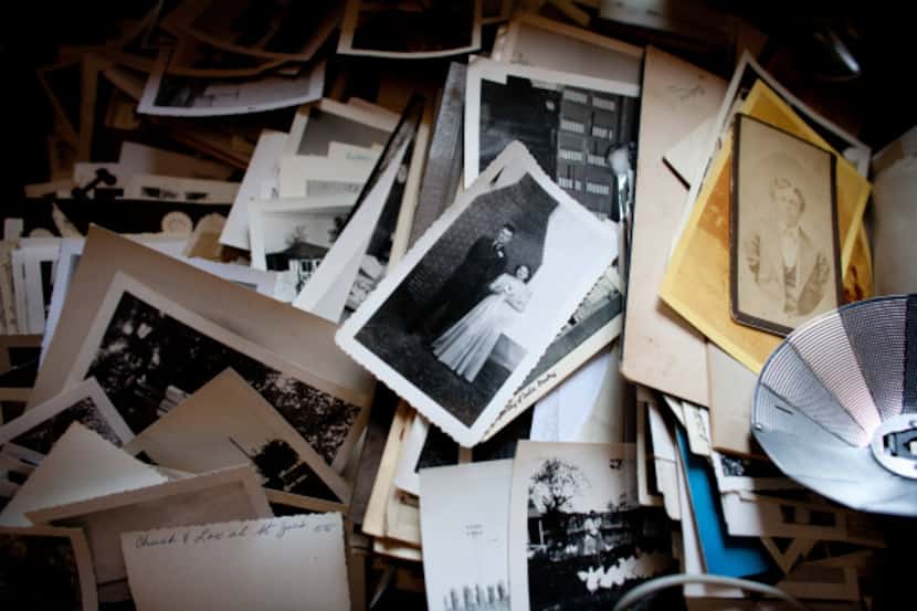 A collection of old photographs in Baker's office