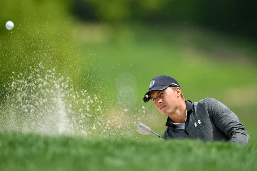 FARMINGDALE, NEW YORK - MAY 17: Jordan Spieth of the United States plays a shot from a...