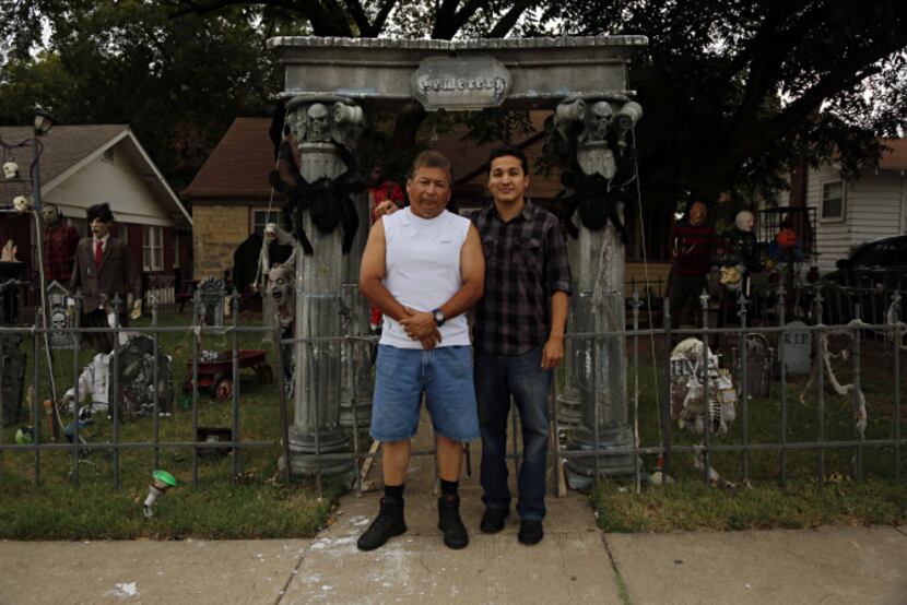 A passion for Halloween decorations runs in the family of Ralph Granado (left) and son,...