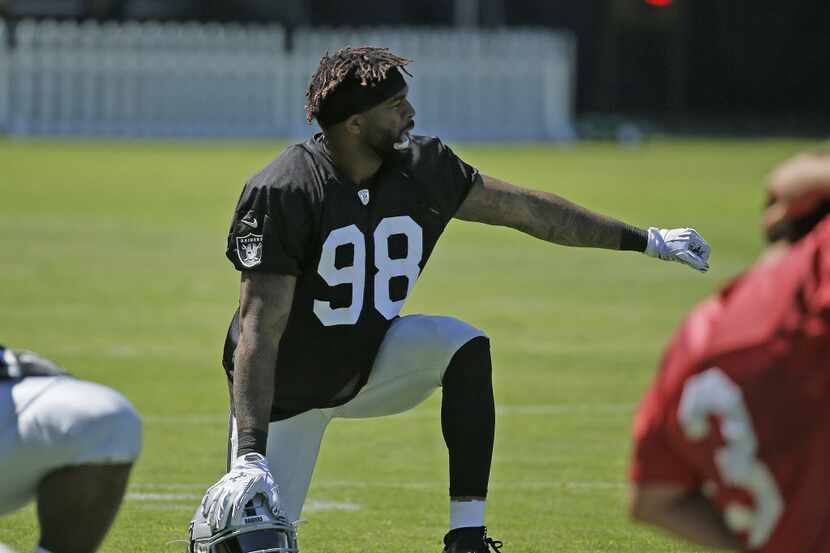 Oakland Raiders defensive end Damontre Moore during practice at the NFL football team's...