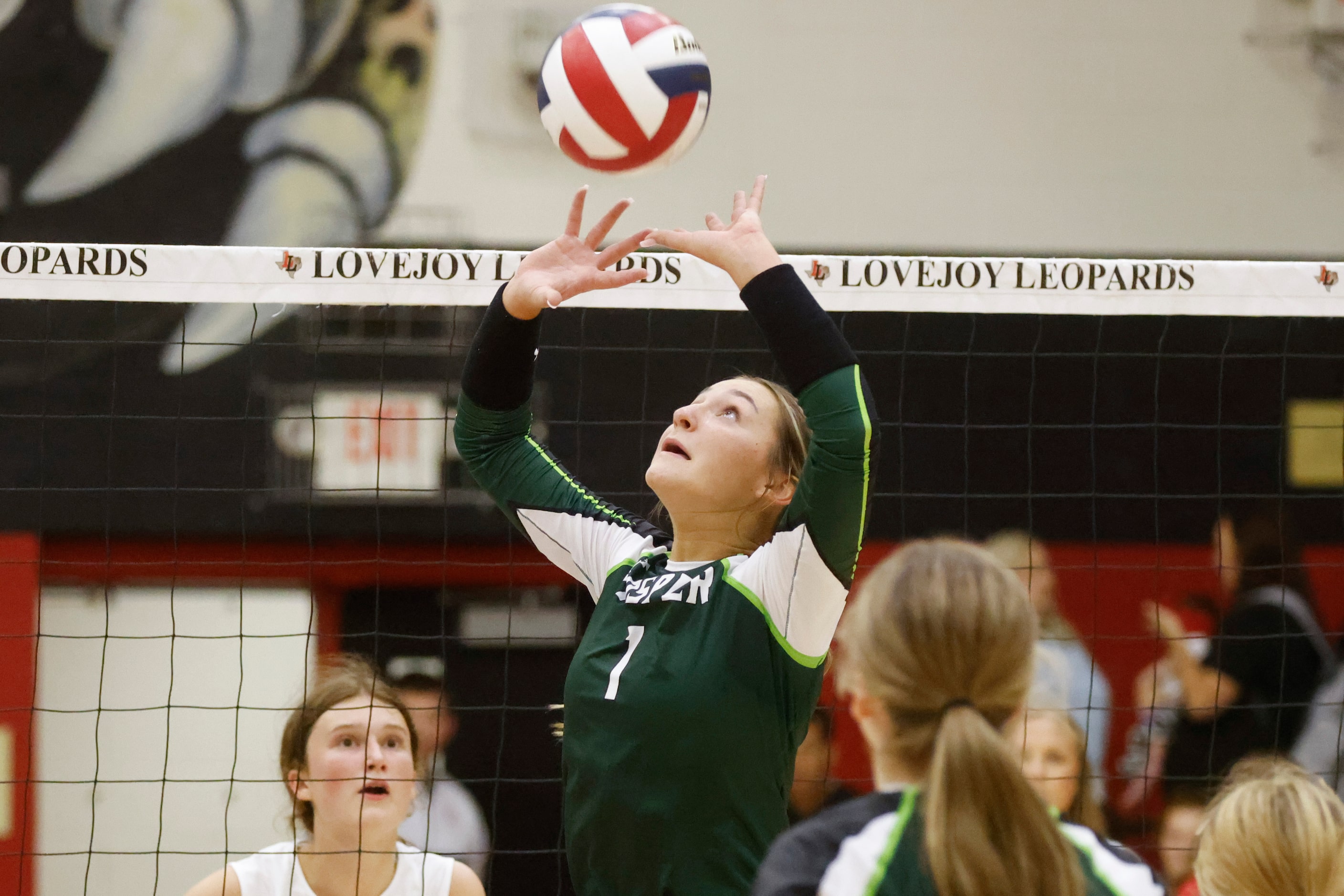 Prosper’s Callie Kieffer lifts the ball against Lovejoy during a season-opening match at...