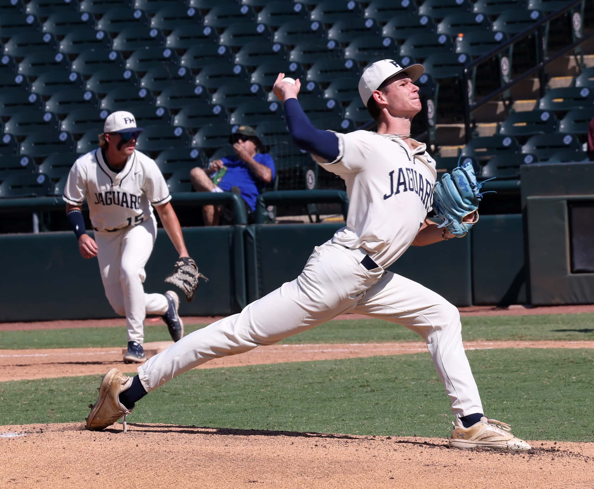 Flower Mound pitcher Zack James (7) delivers a pitch to a Pearland batter during the top of...
