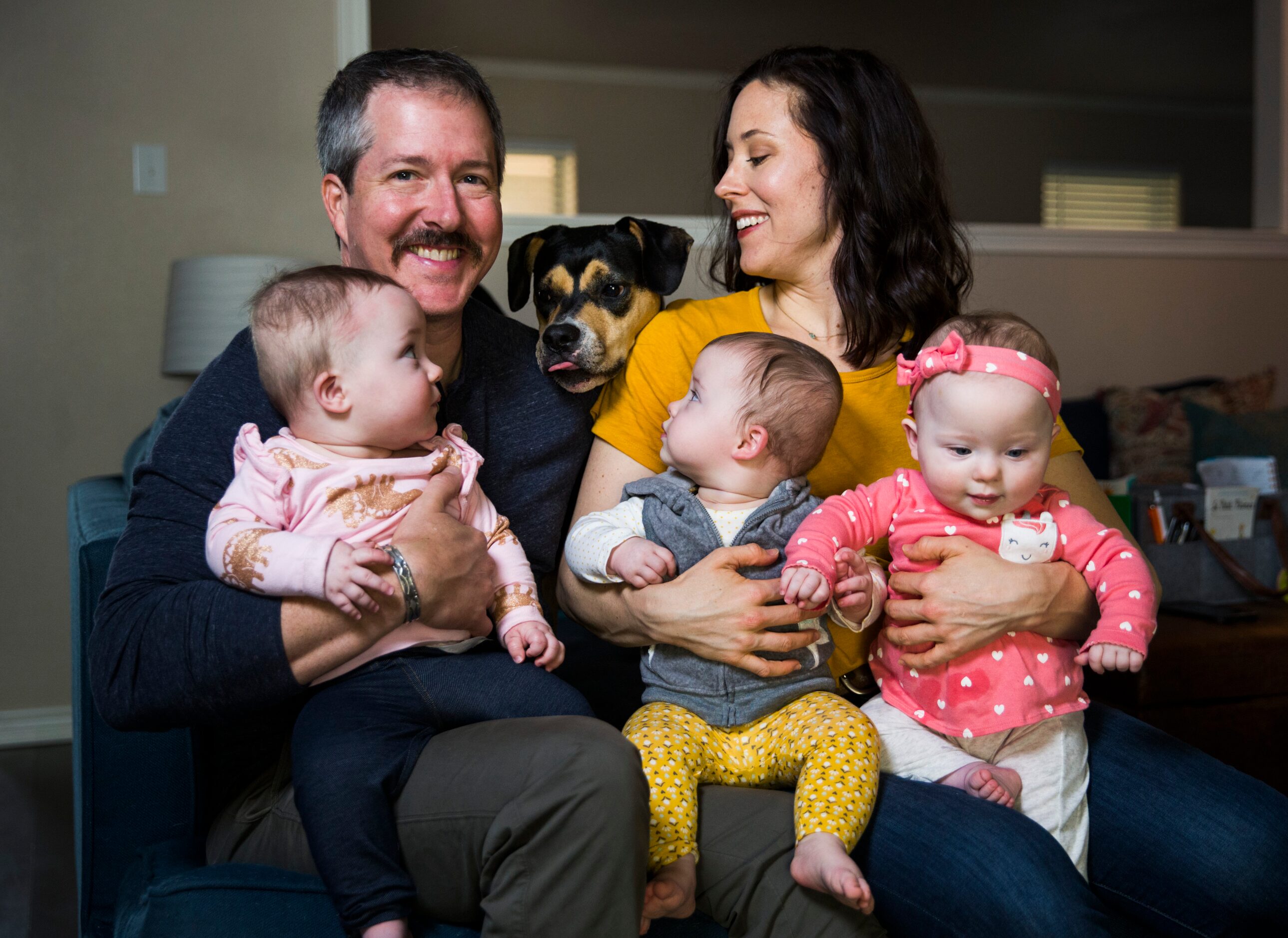 Actress Allison Pistorius, her husband Chris Hury, and their triplets (from left) Austen...