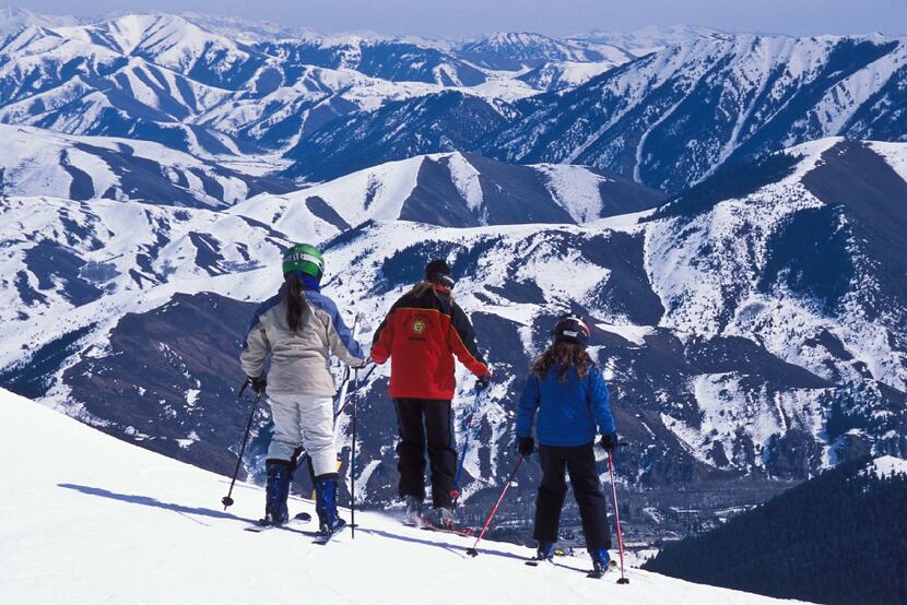A ski instructor leads her charges down a run at Sun Valley. The 80-year-old Idaho resort...