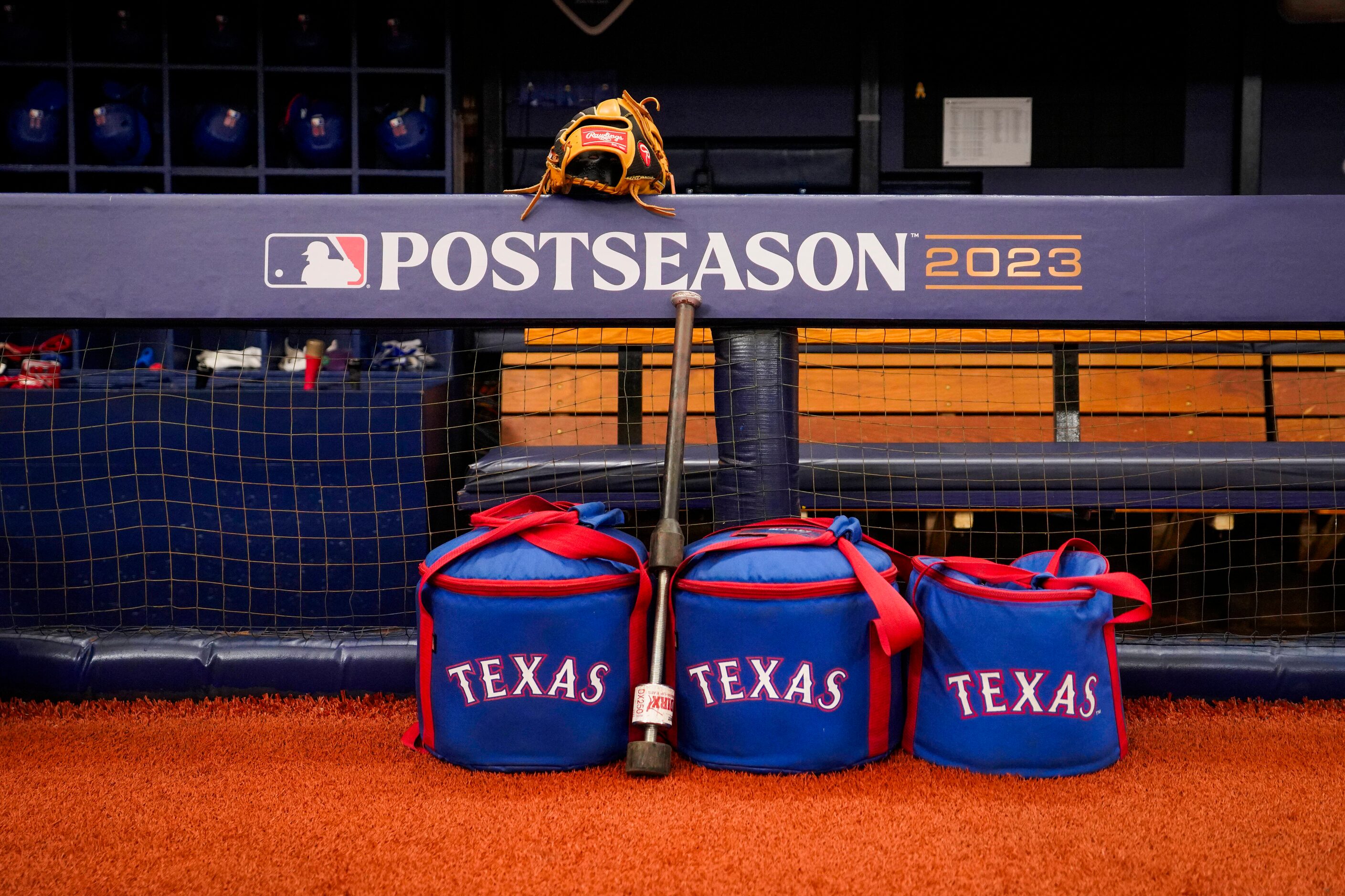 Texas Rangers equipment along the dugout rail before an  American League Wild Card playoff...