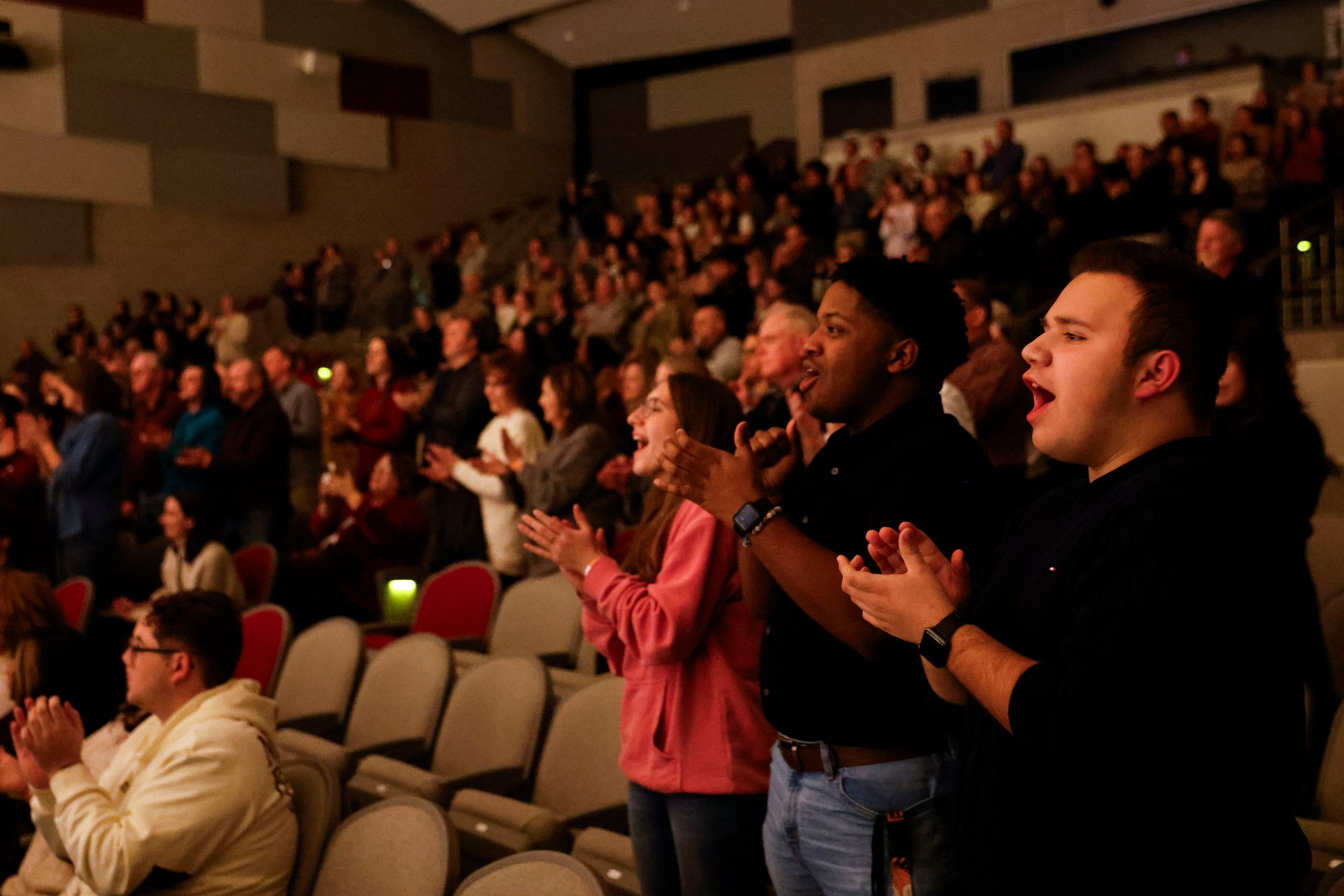 Crowd cheers towards the cast members following the opening night of the Sherman High School...