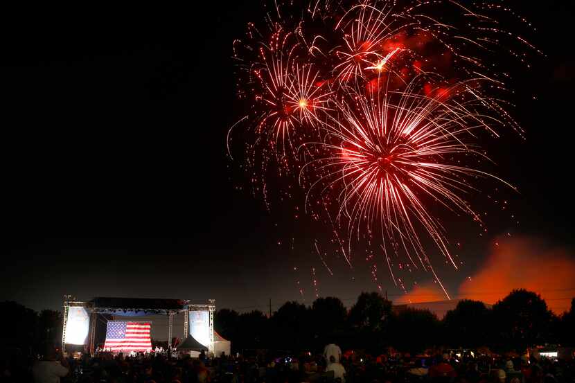 Fireworks explode at the Addison Kaboom Town! 4th of July celebration in Addison, Texas,...