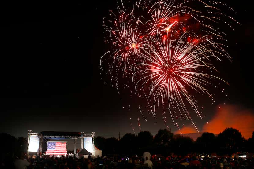 Fireworks explode at the Addison Kaboom Town! 4th of July celebration in Addison, Texas,...