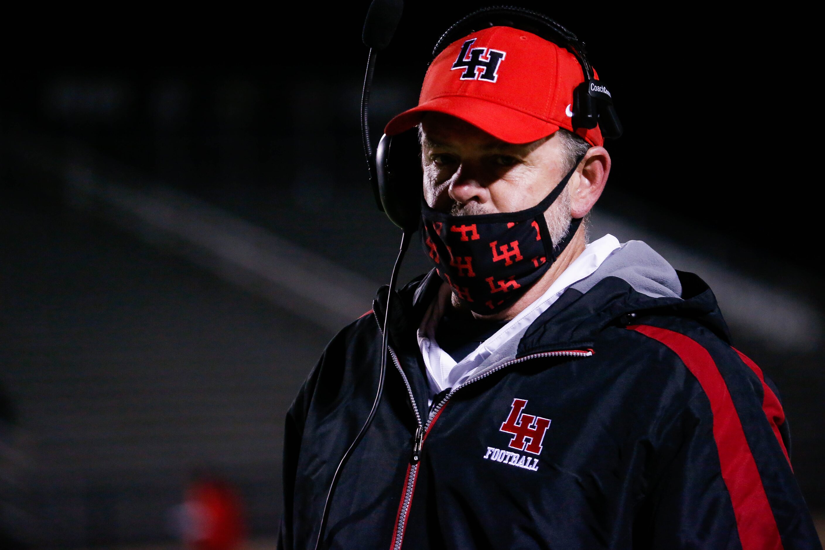 Lake Highlands' coach Lonnie Jordan watches the game during the fourth quarter of a high...