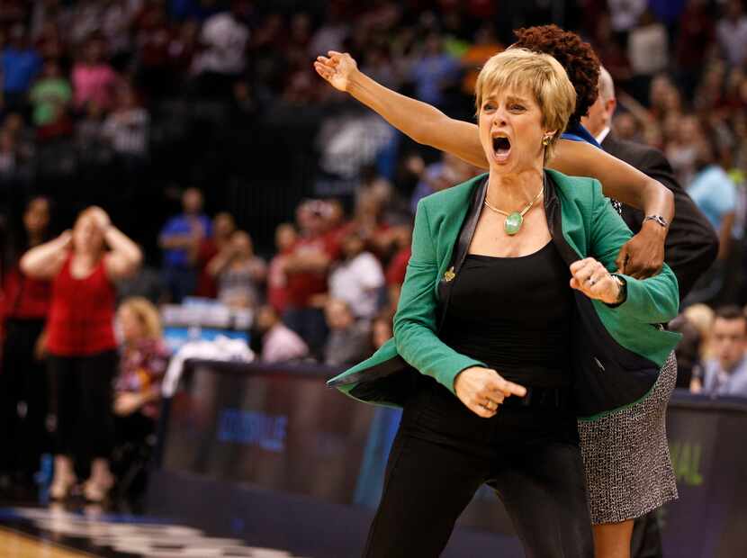 Baylor Bears head coach Kim Mulkey reacts to a foul called on her player in a game against...