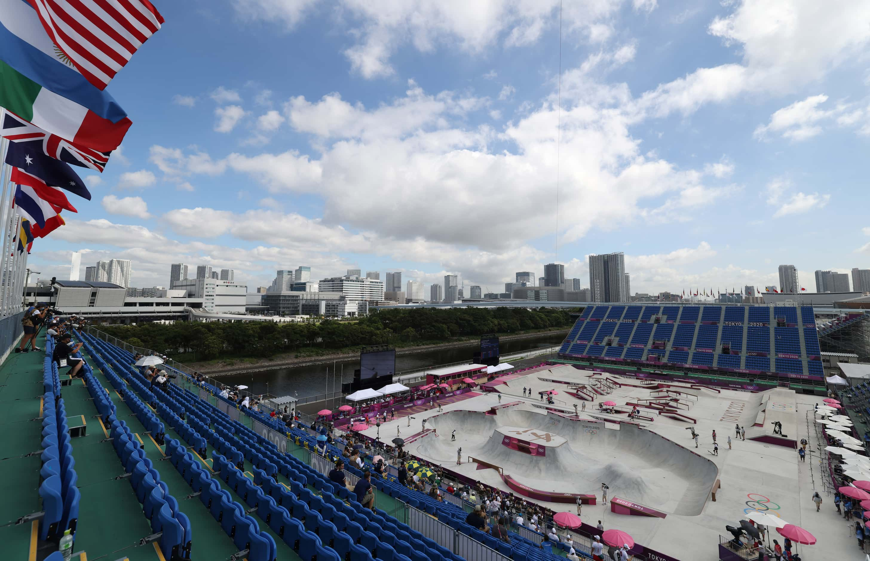 Empty seats are seen against the skyline during the women’s skateboarding prelims at the...