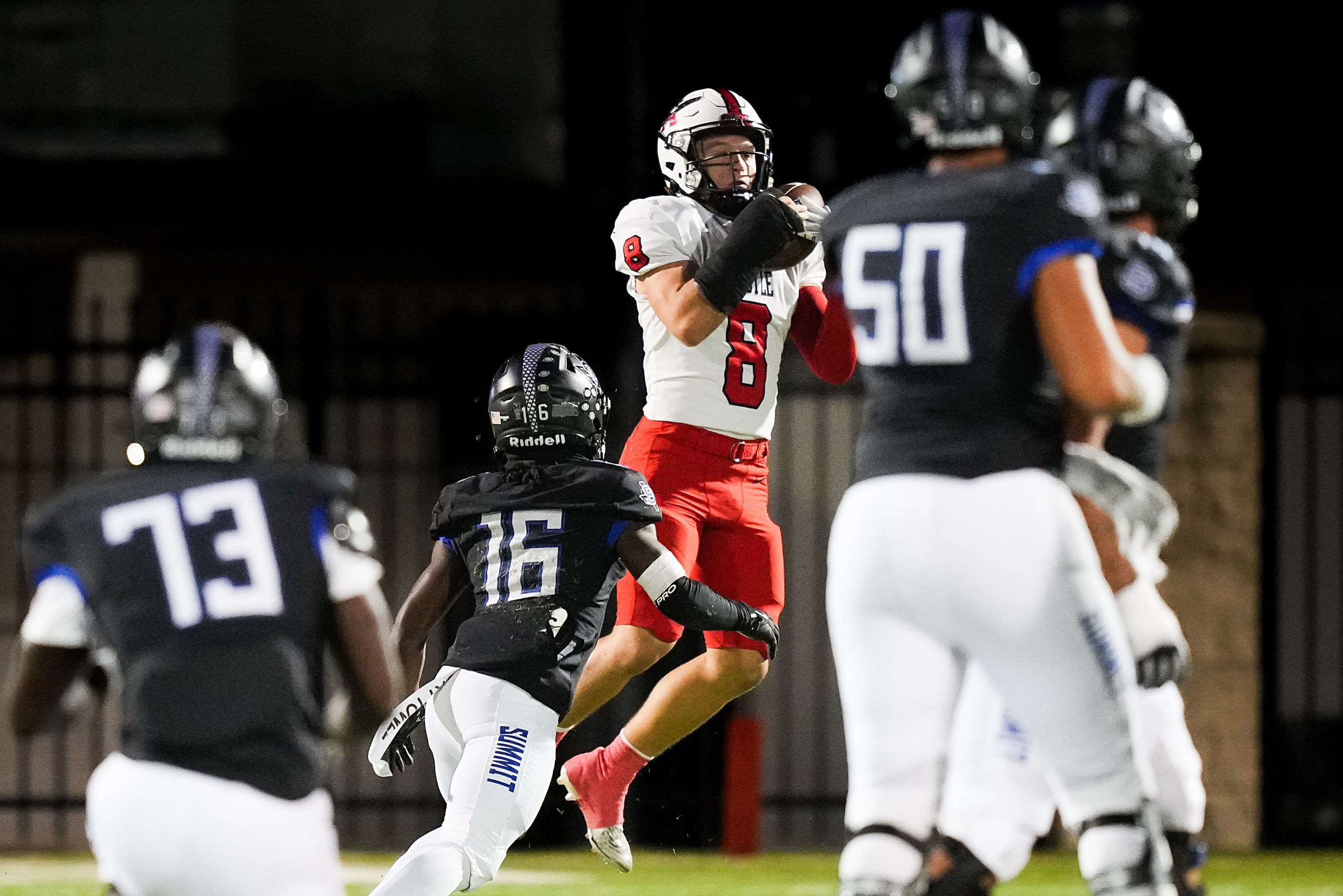 Argyle defensive back Nathaniel Bruce (8) intercepts a pass intended for Mansfield Summit...