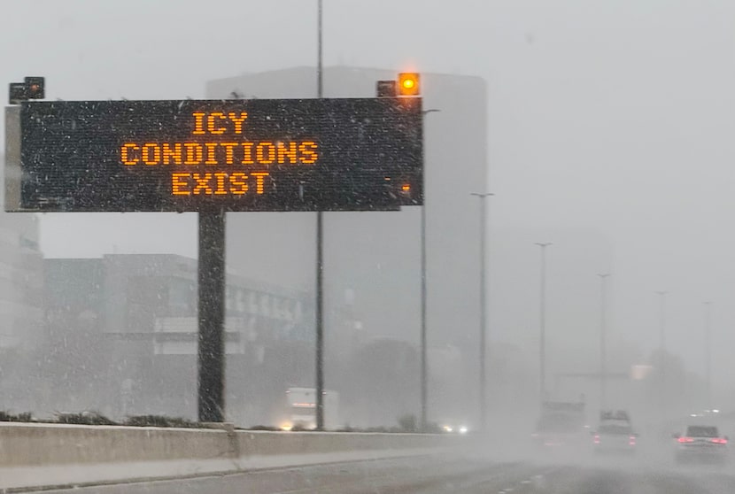 A TxDOT sign warns drivers of icy conditions on U.S. Highway 75, Thursday, Jan. 9, 2025, in...