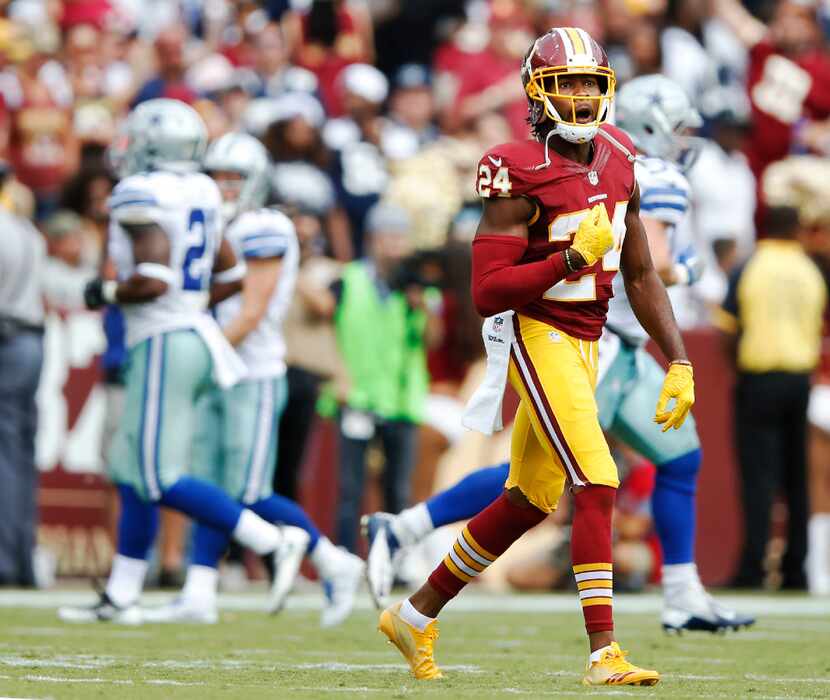 FILE - Washington Redskins cornerback Josh Norman (24) celebrates after forcing a fumble and...