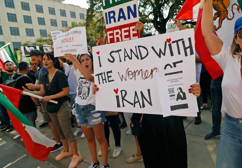 Protesters turned out to bring attention to conditions in Iran at Dealy Center in downtown...