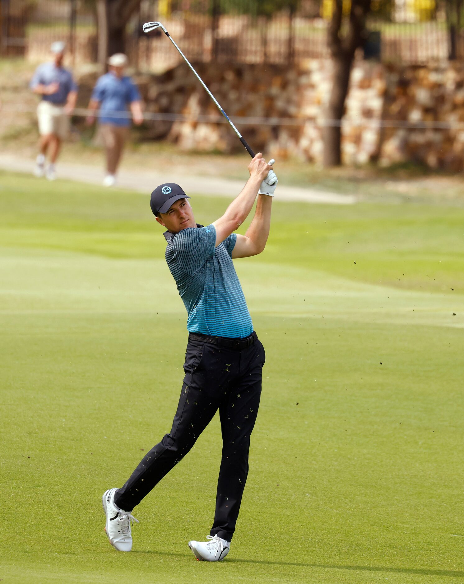 Jordan Spieth watches after hitting from the fairway of the 16th hole during round 3 of the...