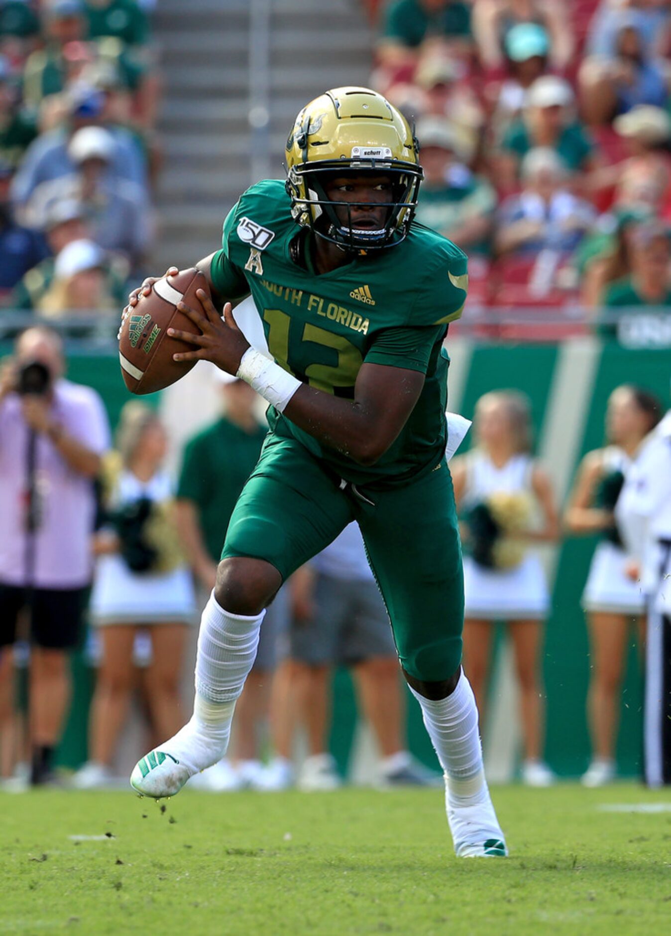 TAMPA, FLORIDA - SEPTEMBER 28:  Jordan McCloud #12 of the South Florida Bulls passes during...