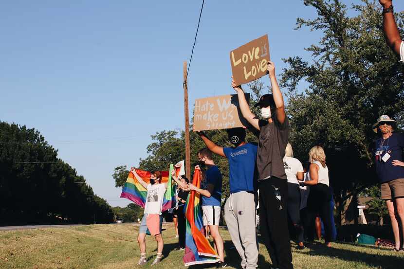 Protestors gather outside of Covenant Christian Academy in Colleyville on Aug. 20, 2020 to...