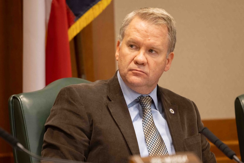 Texas Rep. David Cook listens during a House Committee on Criminal Jurisprudence meeting...