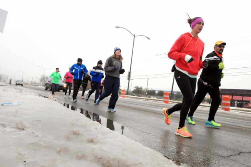 A group of runners was led by Jessica Riley, 31, of Tatum and Santana Gonzales, 48, of...