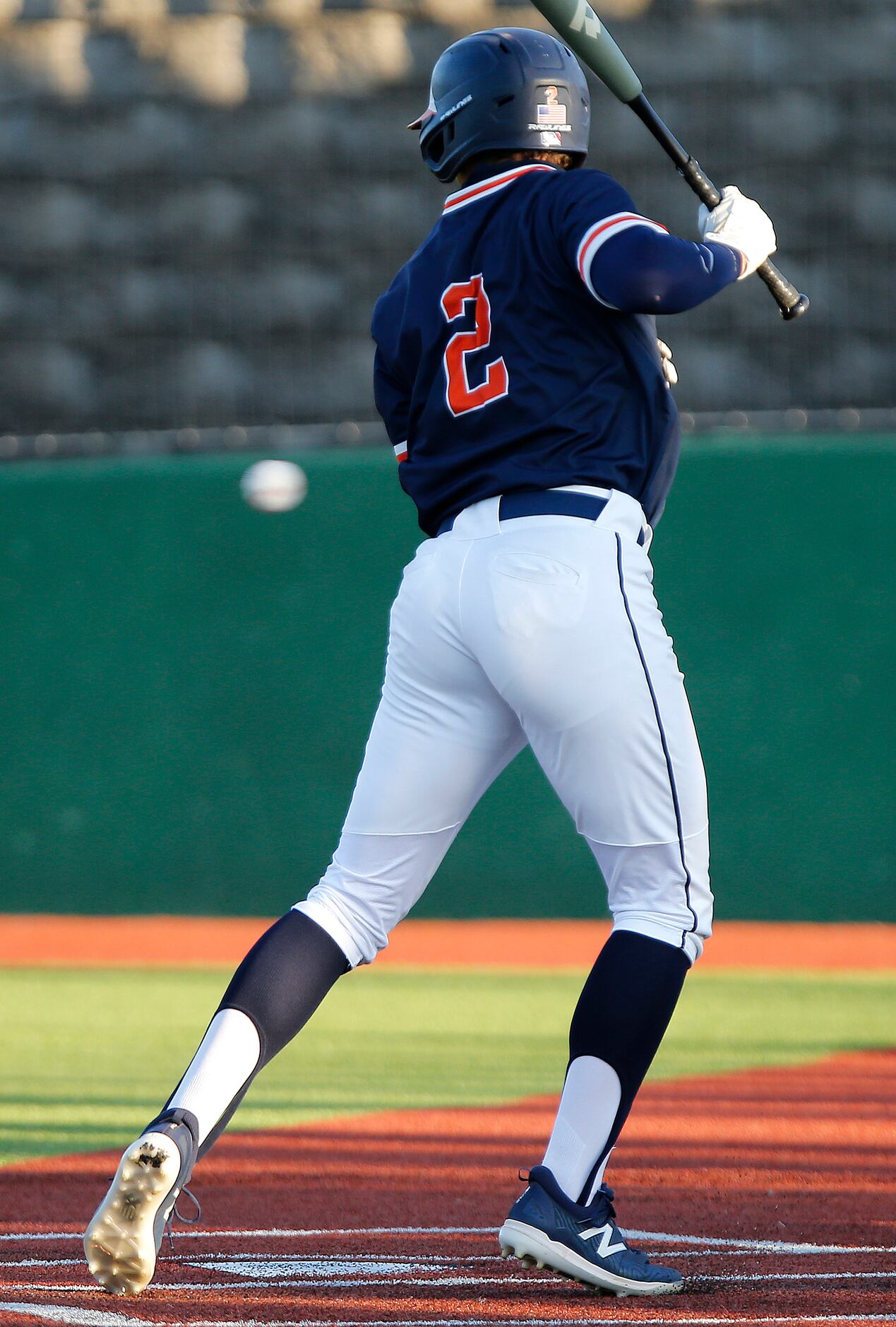 Wakeland High School right fielder Jason Young (2) is hit by a pitch in the second inning...