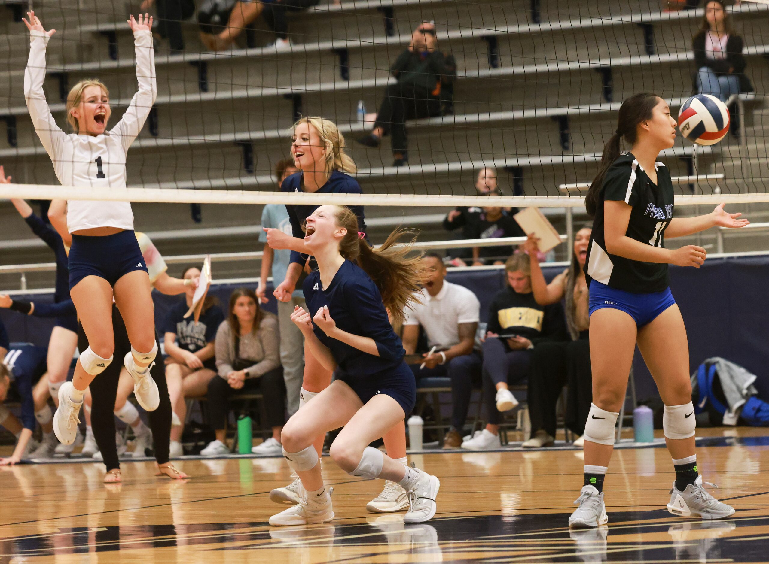 Flower Mound High School players react to scoring against Plano West Senior High School,...