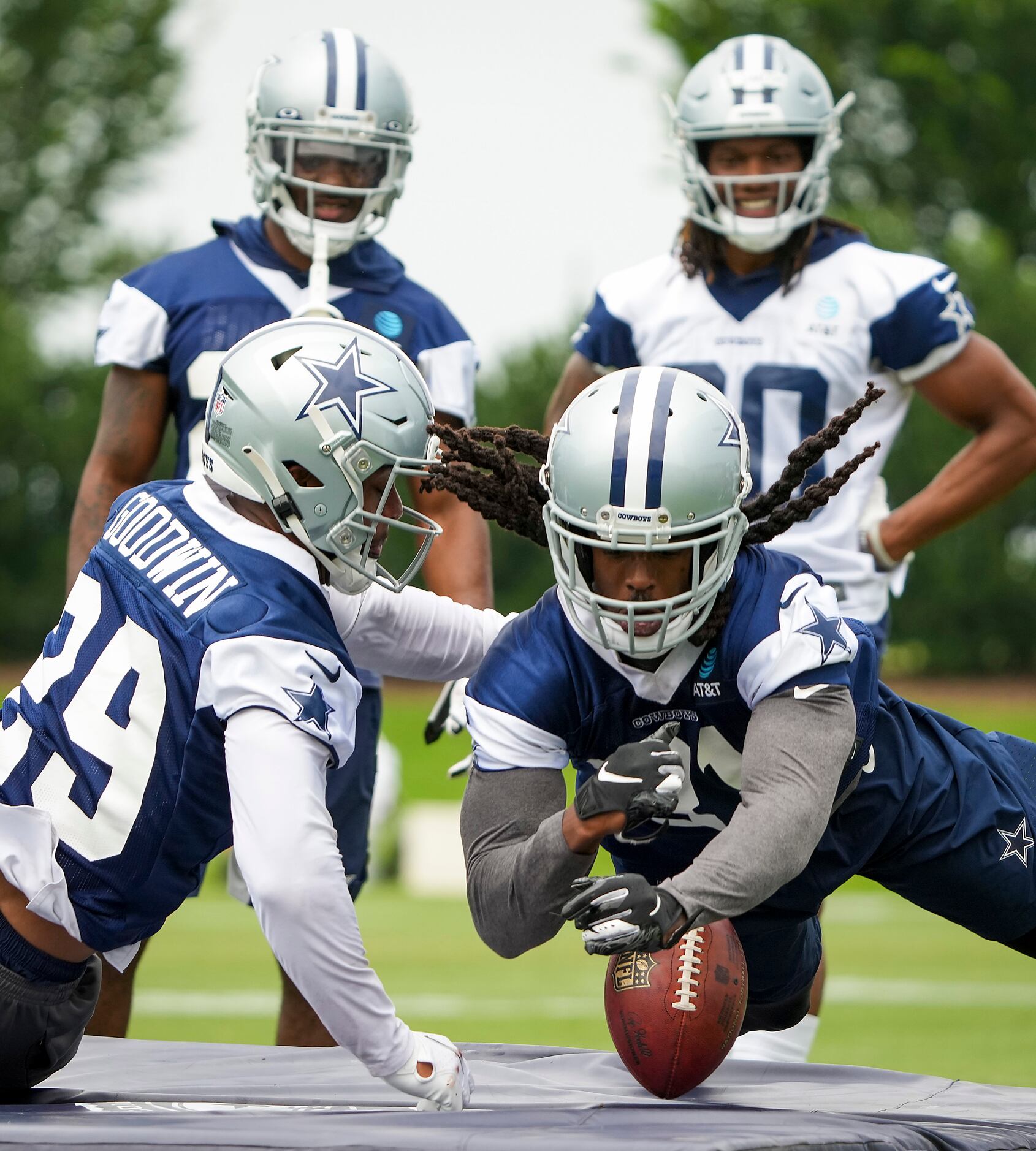 Dallas Cowboys cornerback Maurice Canady (31) loses the ball while participating in a fumble...