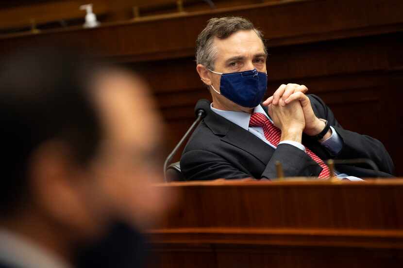 Rep. Van Taylor, R-Texas, listens as Treasury Secretary Steve Mnuchin testifies during a...