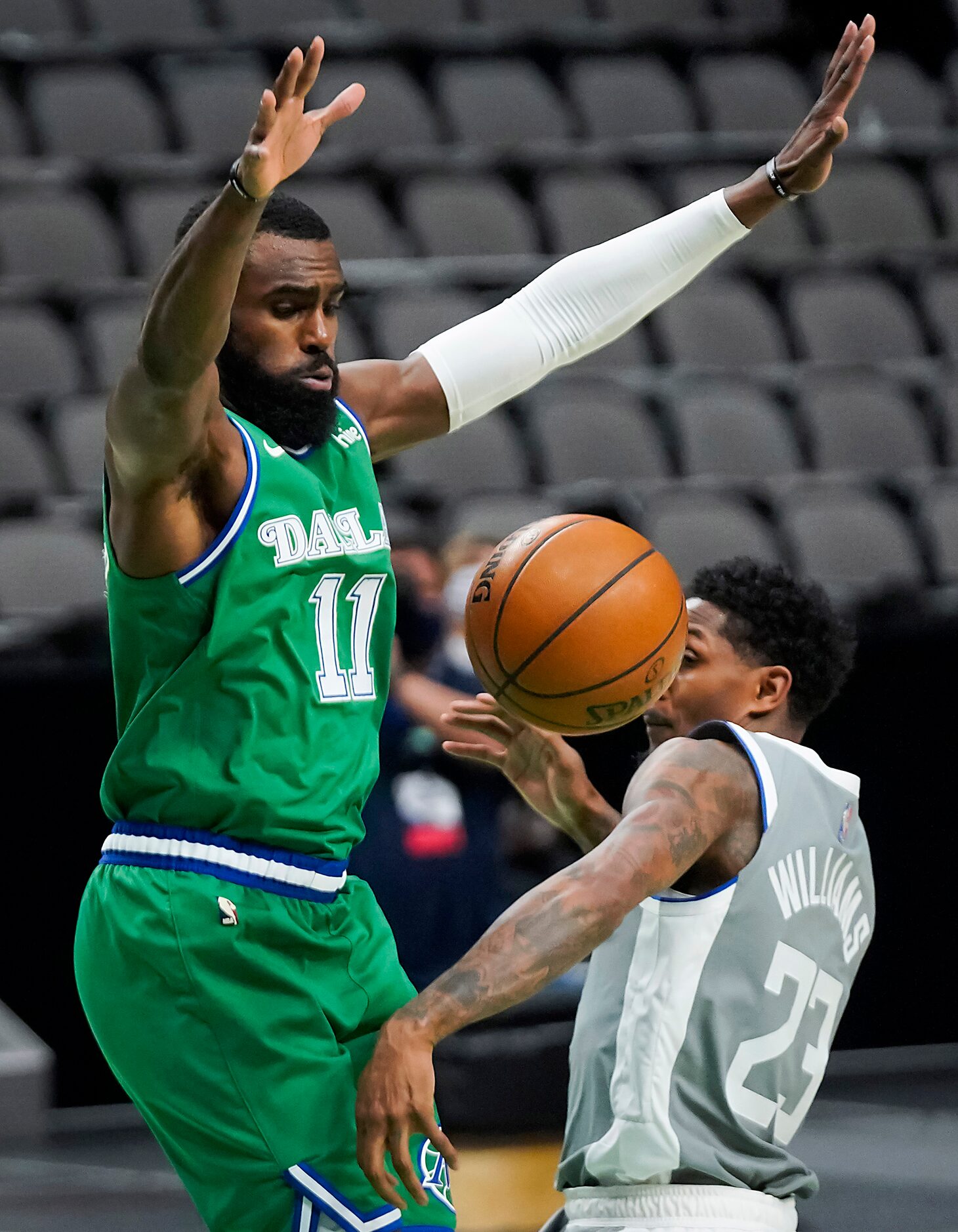 Dallas Mavericks forward Tim Hardaway Jr. (11) defends against LA Clippers guard Lou...