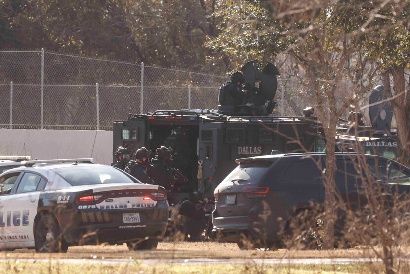 Squad cars, SWAT and Dallas Fire-Rescue respond to an active scene near Keeton Park Golf...