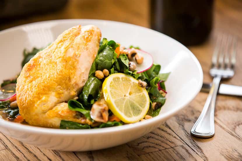 Roast chicken with greens and radishes by Andrea Shackelford at Harvest