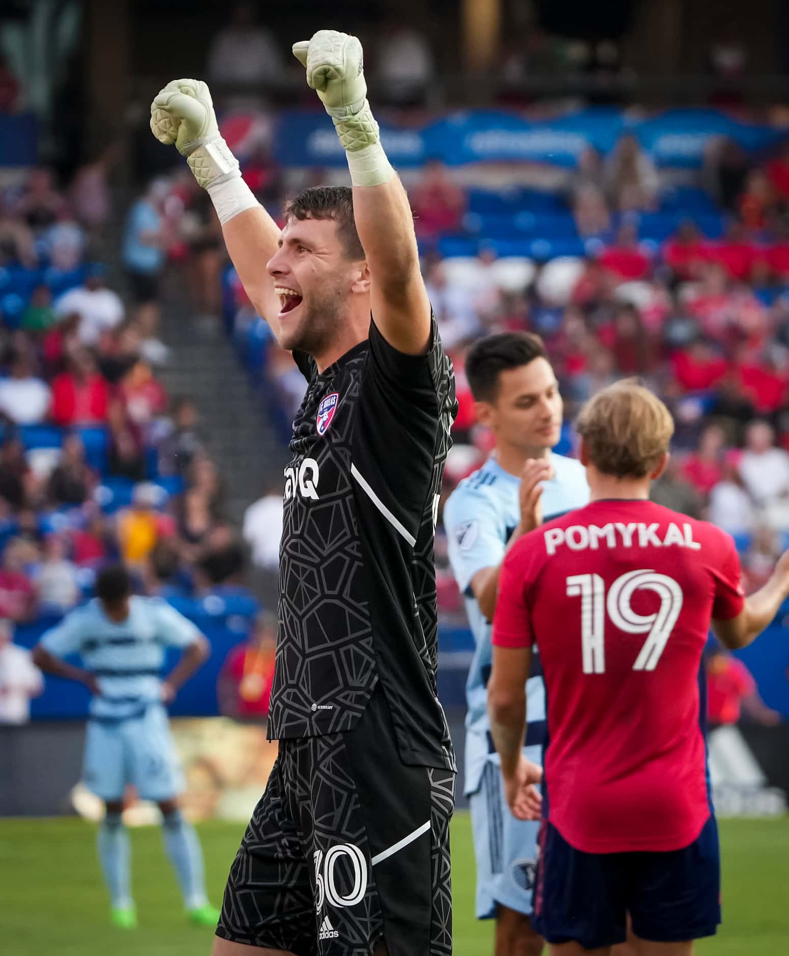 FC Dallas goalkeeper Maarten Paes (30) celebrates after a 2-1 victory over Sporting Kansas...