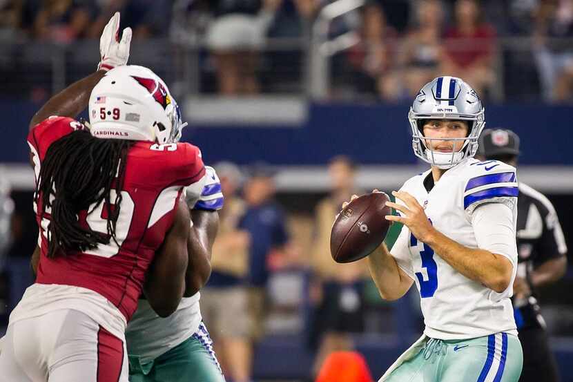 Dallas Cowboys quarterback Mike White (3) throws a pass during the second half of a...