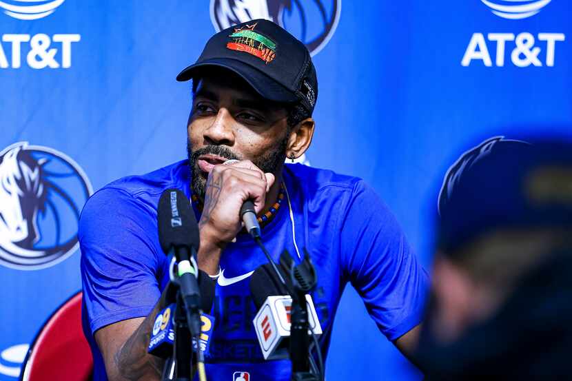 Dallas Mavericks guard Kyrie Irving addresses a press conference on Tuesday, Feb. 7, 2023,...