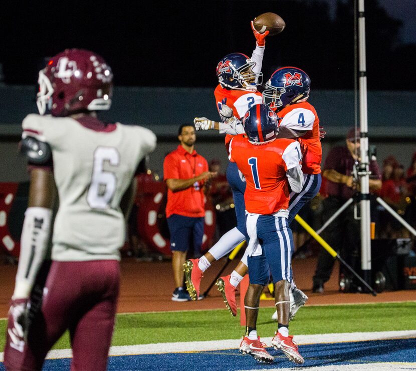 McKinney Boyd running back Ja Tyler Shaw (2) celebrates scoring a touchdown with wide...