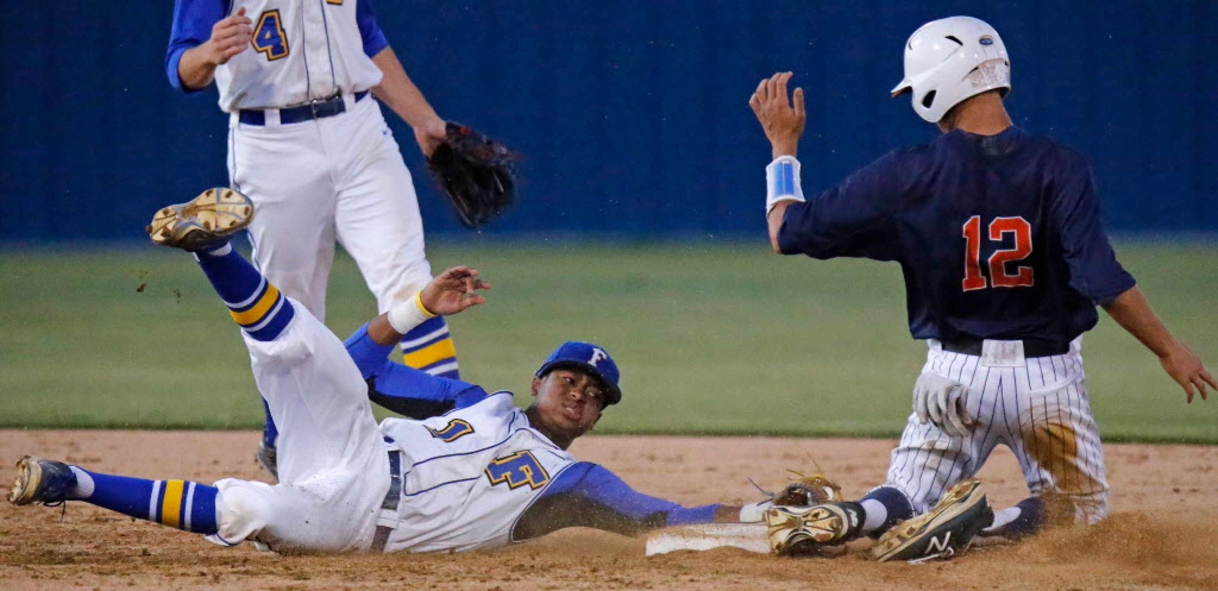 Frisco High School second baseman Everrett Harris (1) was too late to make the tag on Frisco...