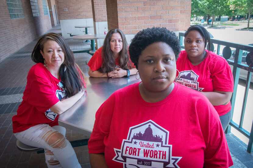 Pamela Young, center, lead criminal justice organizer at United Fort Worth, which runs the...