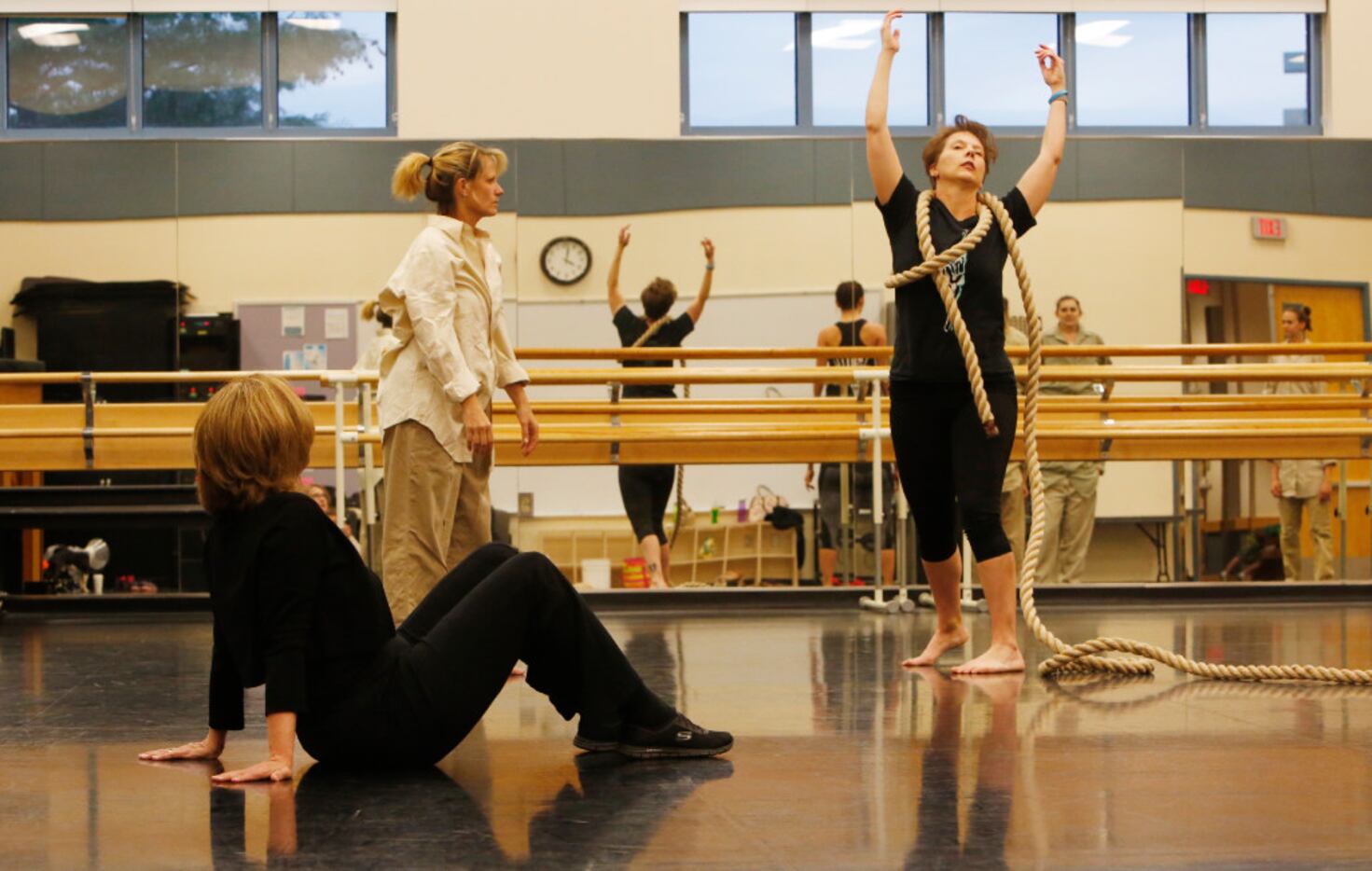 Elledanceworks co-founder Michele Hanlon, seated, watches rehearsal of her new piece,...
