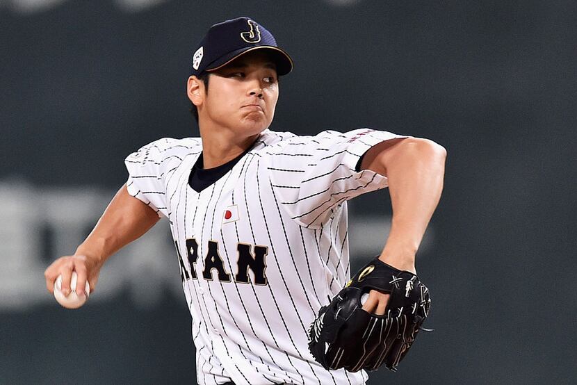 SAPPORO, JAPAN - NOVEMBER 08:  Starting pitcher Shohei Otani #16 throws in the top of second...