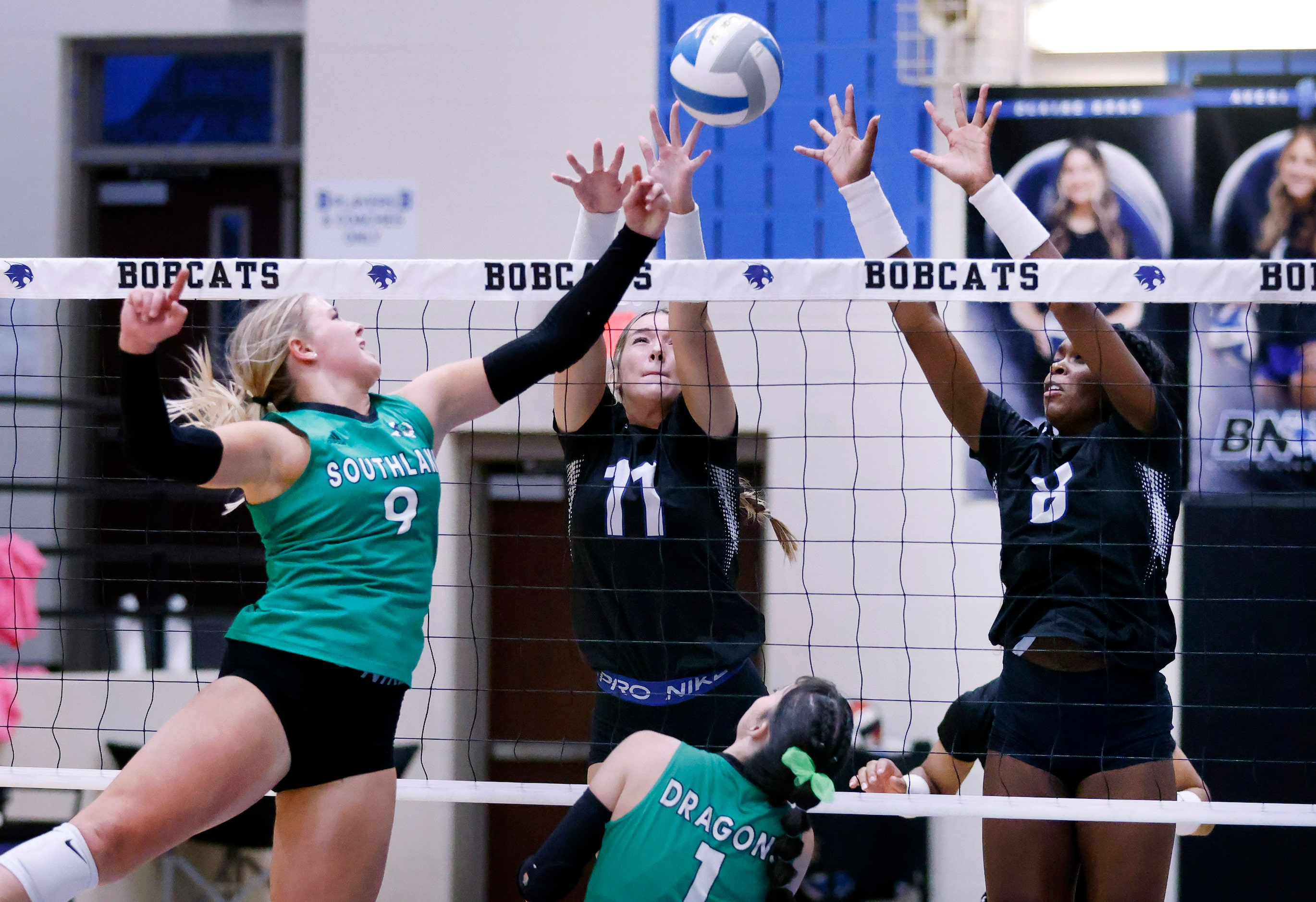 Southlake Carroll outside hitter Taryn Barnes (9) attempts to tip the ball past Trophy Club...