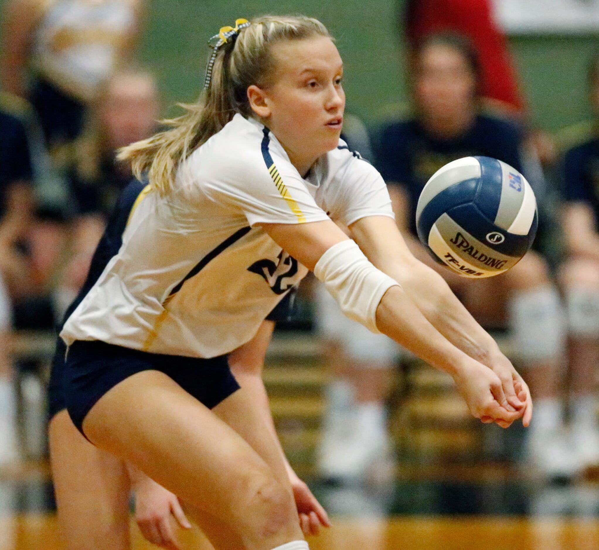 Highland Park High School Kennedy Westendorff (22) passes a serve during game two as Lovejoy...
