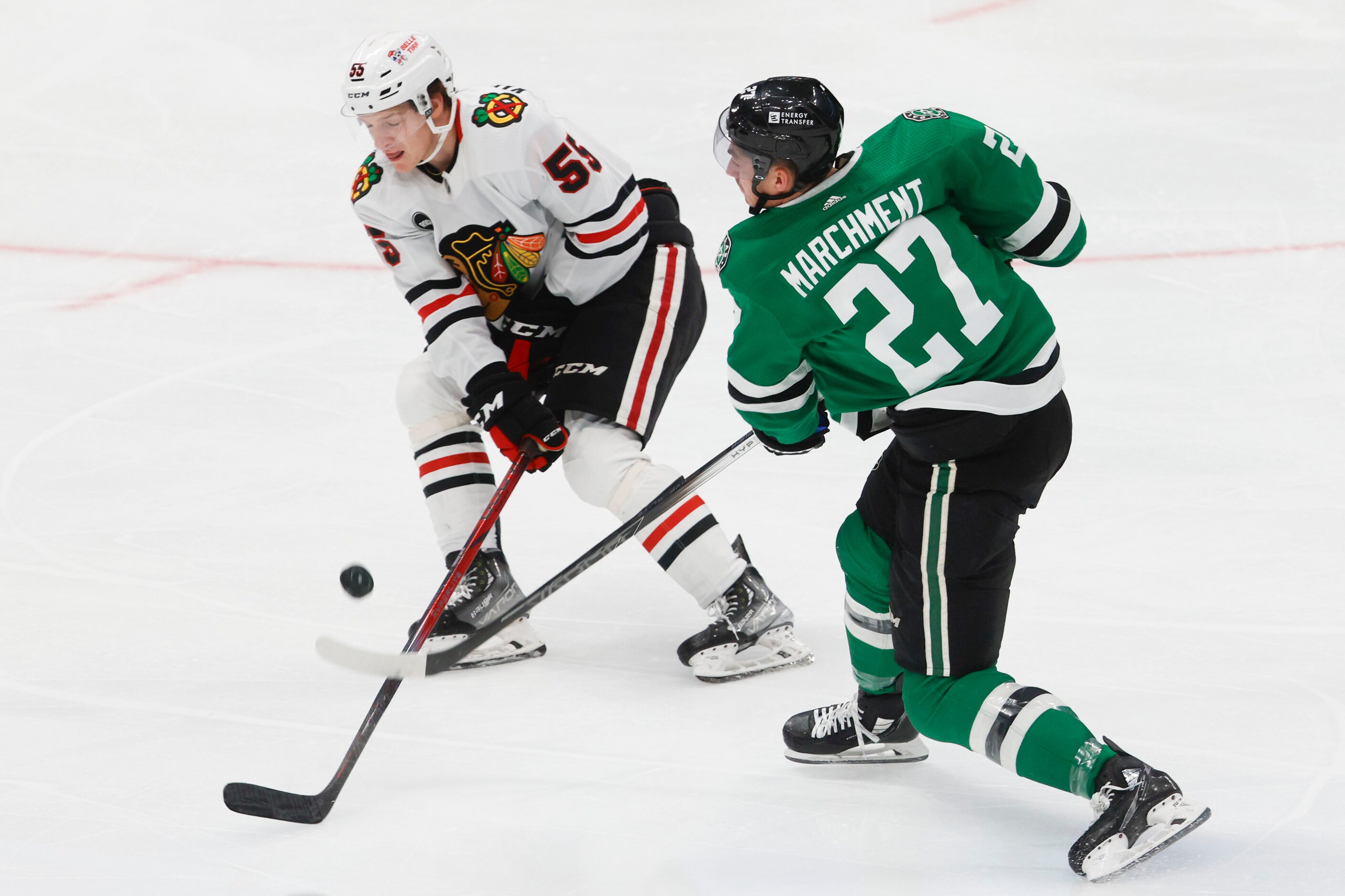 Dallas Stars left wing Mason Marchment (27) handles the ball against Chicago Blackhawks...