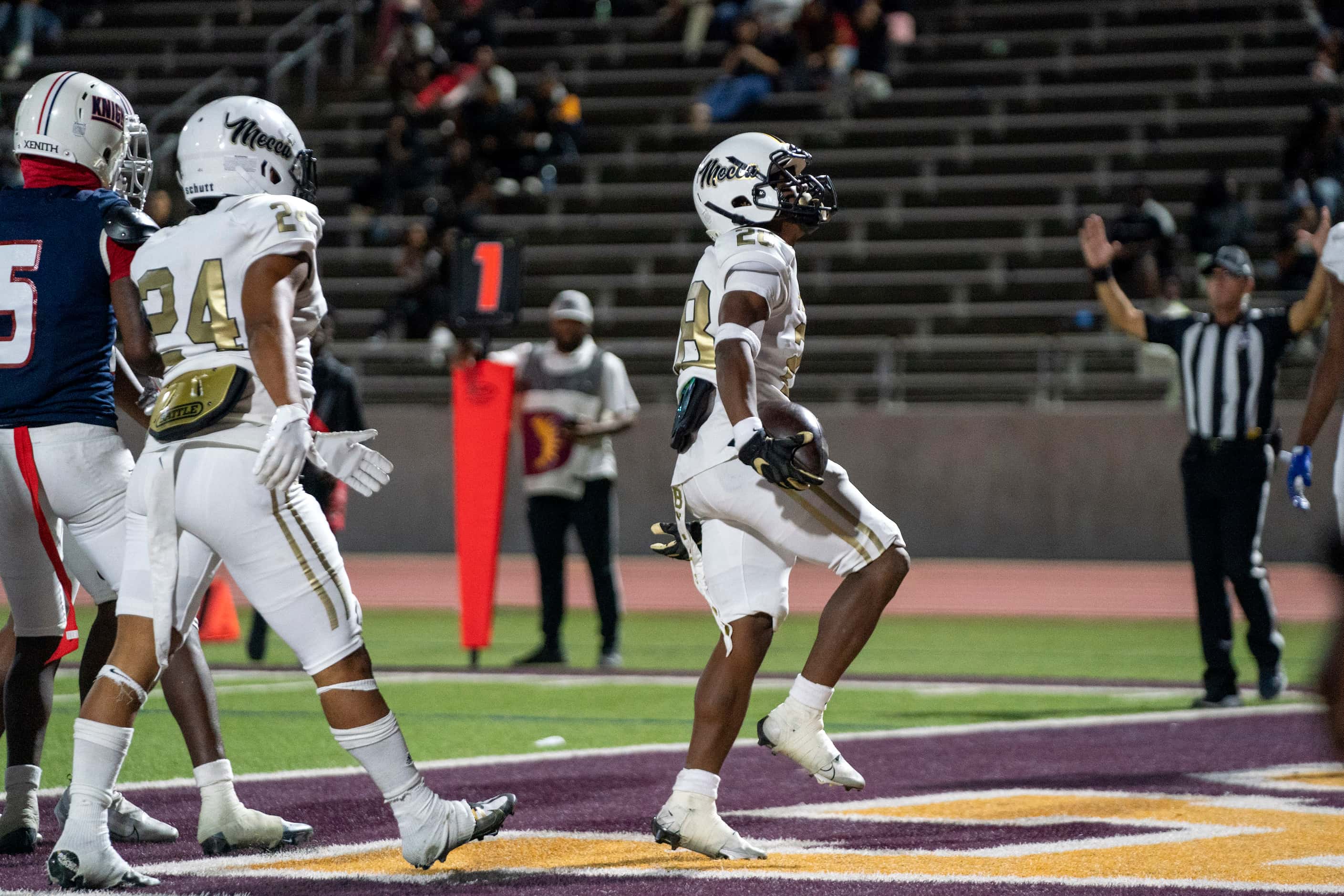 South Oak Cliff senior running back Izale Williams (28) exults after running for a touchdown...