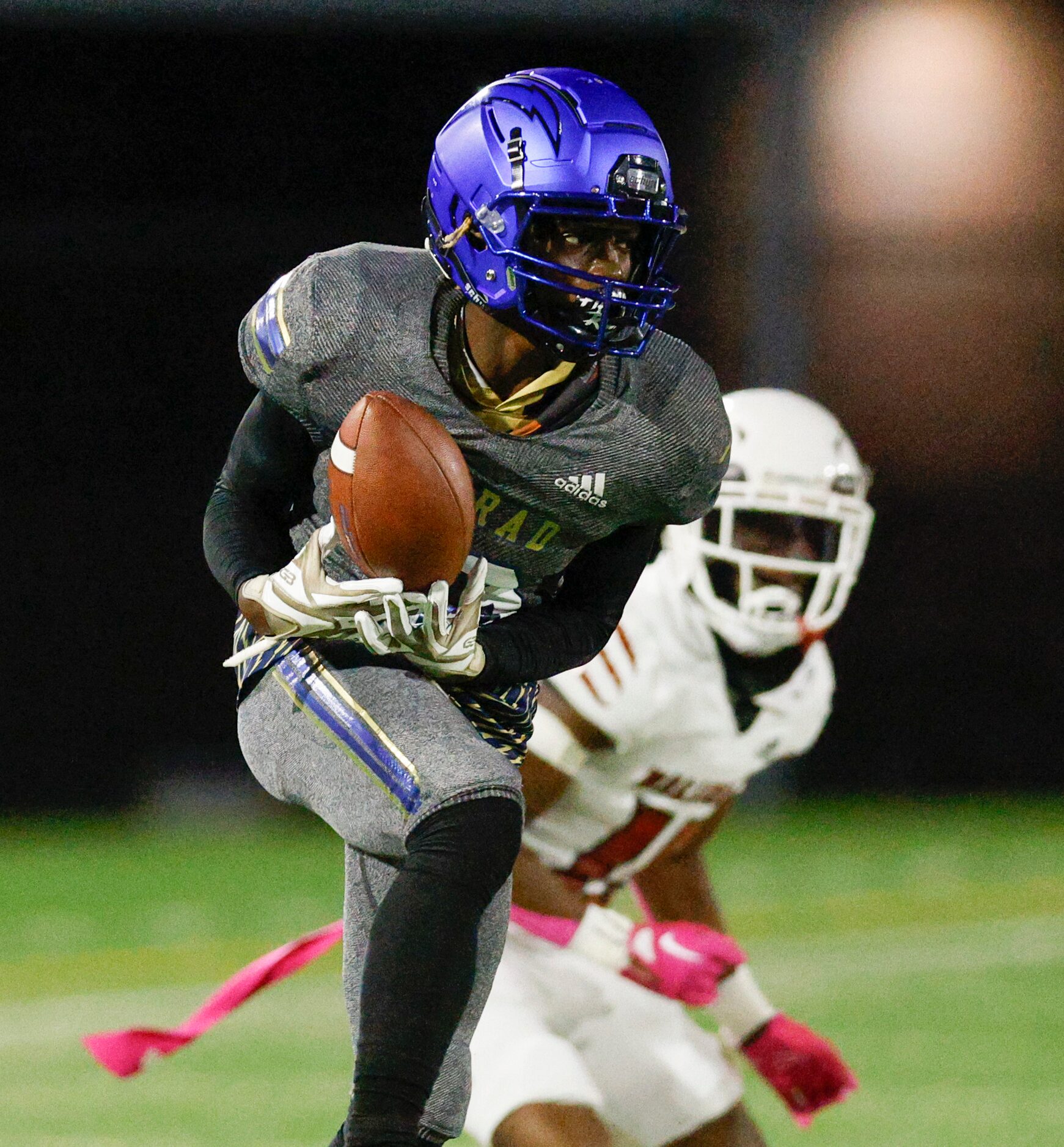 Conrad wide receiver Jaquarius Gordon (13) hauls in a pass during the first half of a game...