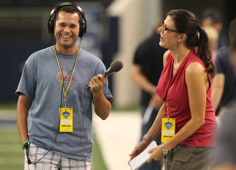 Corby Davidson of KTCK interviews Gina Miller after afternoon practice at Dallas Cowboys...