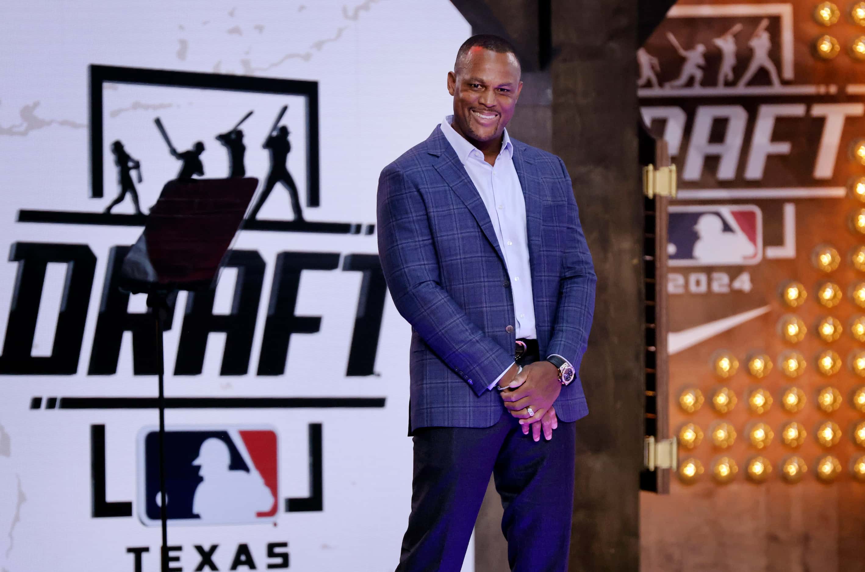 Texas Rangers newest Hall of Famer Adrian Beltre waves to fans he’s introduced before Day 1...
