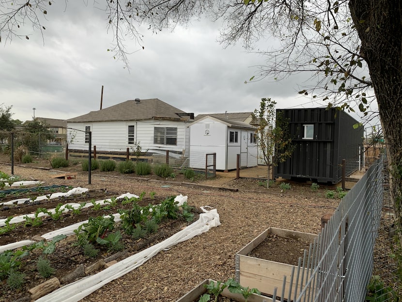 Behind Bonton Farms on Bexar Street, a homeless family and others live in Pallet shelters...